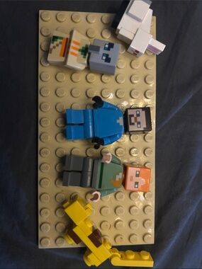Lego Minecraft weird little family of Steve, Alex, rabbit, villager, kitty